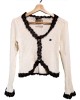 二手奢侈品Chanel香奈兒米白滚邊黑色蕾絲綿製短上衣(9.9新,肩40胸42長47)-編號S37